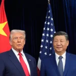President Donald Trump, left, and Chinese President Xi Jinping, right, pose for photo before their US-China summit at Gimhae international airport in Busan, South Korea, on October 30, 2025 [Mark Schiefelbein/AP Photo]